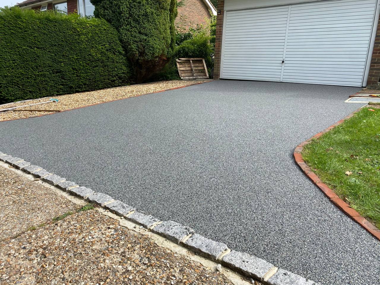 This is a photo of a new resin bound driveway carried out in Oldham All works done by Oldham Resin Driveways